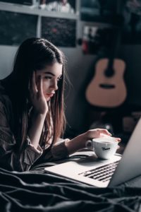 young girl using a laptop