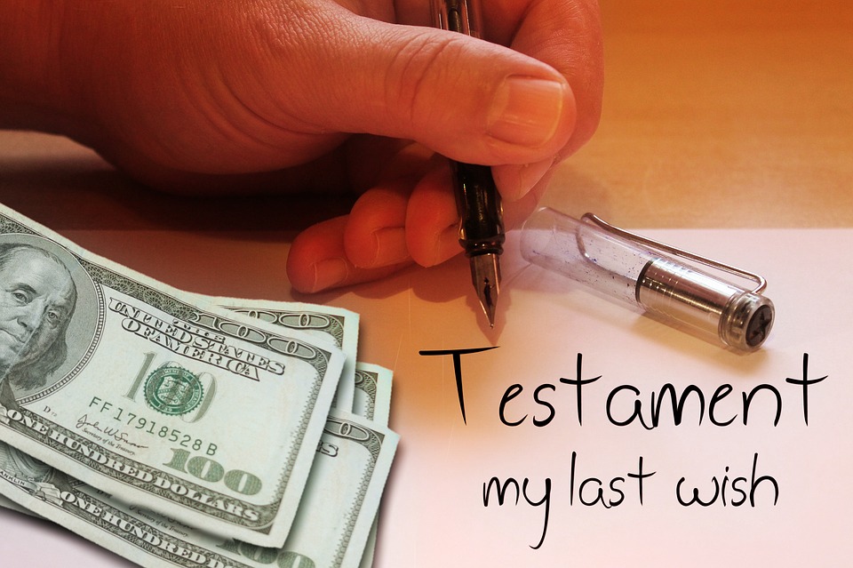 hand next to pile of $100 writing "testament my last wish"